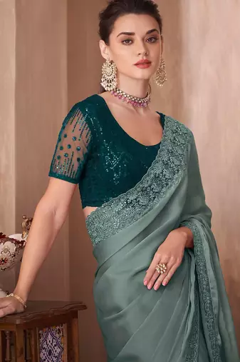 sea_green sea green embellished sequinned border saree