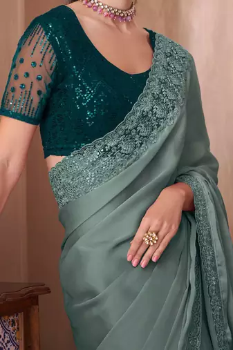 sea_green sea green embellished sequinned border saree
