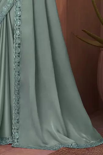 sea_green sea green embellished sequinned border saree