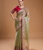 red ethnic motifs sequinned silk blend saree