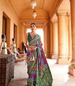 pink ethnic motifs printed zari patola saree