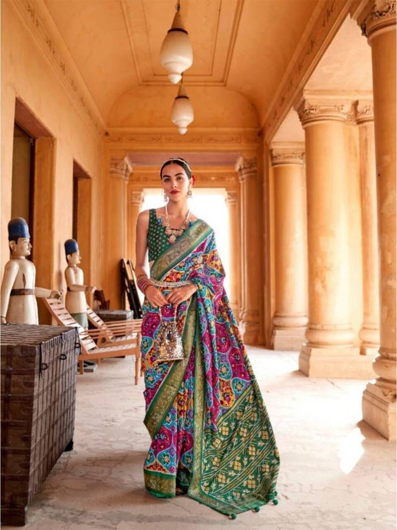 pink ethnic motifs printed zari patola saree