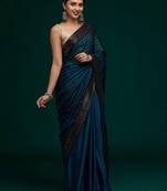 teal teal black striped sequinned poly georgette saree