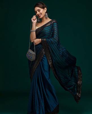 teal teal black striped sequinned poly georgette saree 2