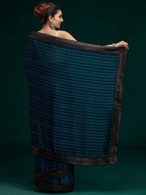 teal teal black striped sequinned poly georgette saree 3