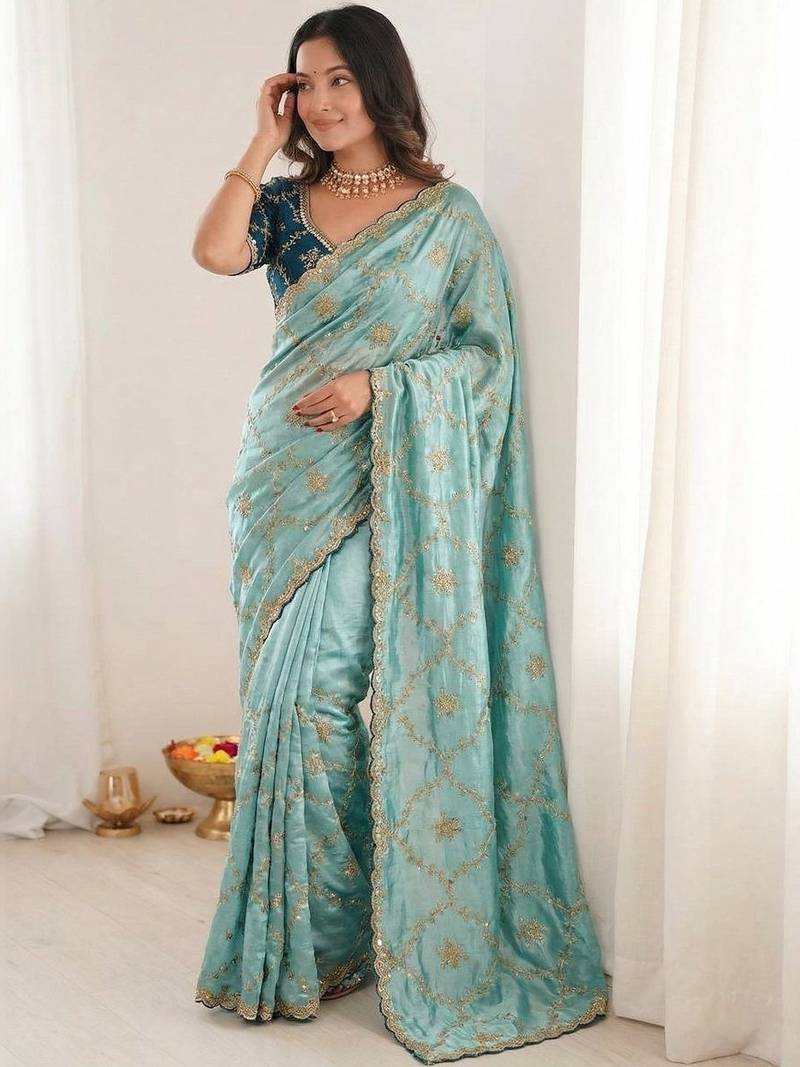 turquoise embellished embroidered organza heavy work saree