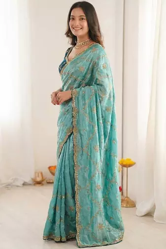 turquoise embellished embroidered organza heavy work saree