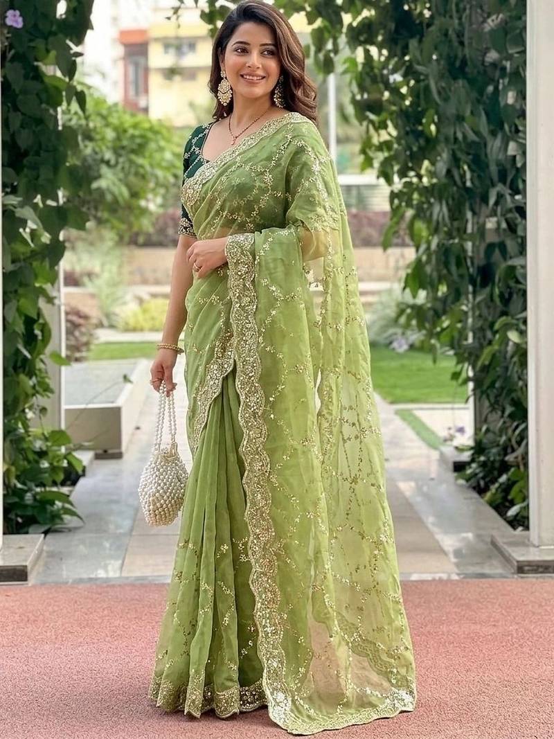 green embellished embroidered pure georgette heavy work saree