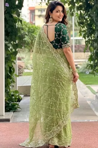 green embellished embroidered pure georgette heavy work saree