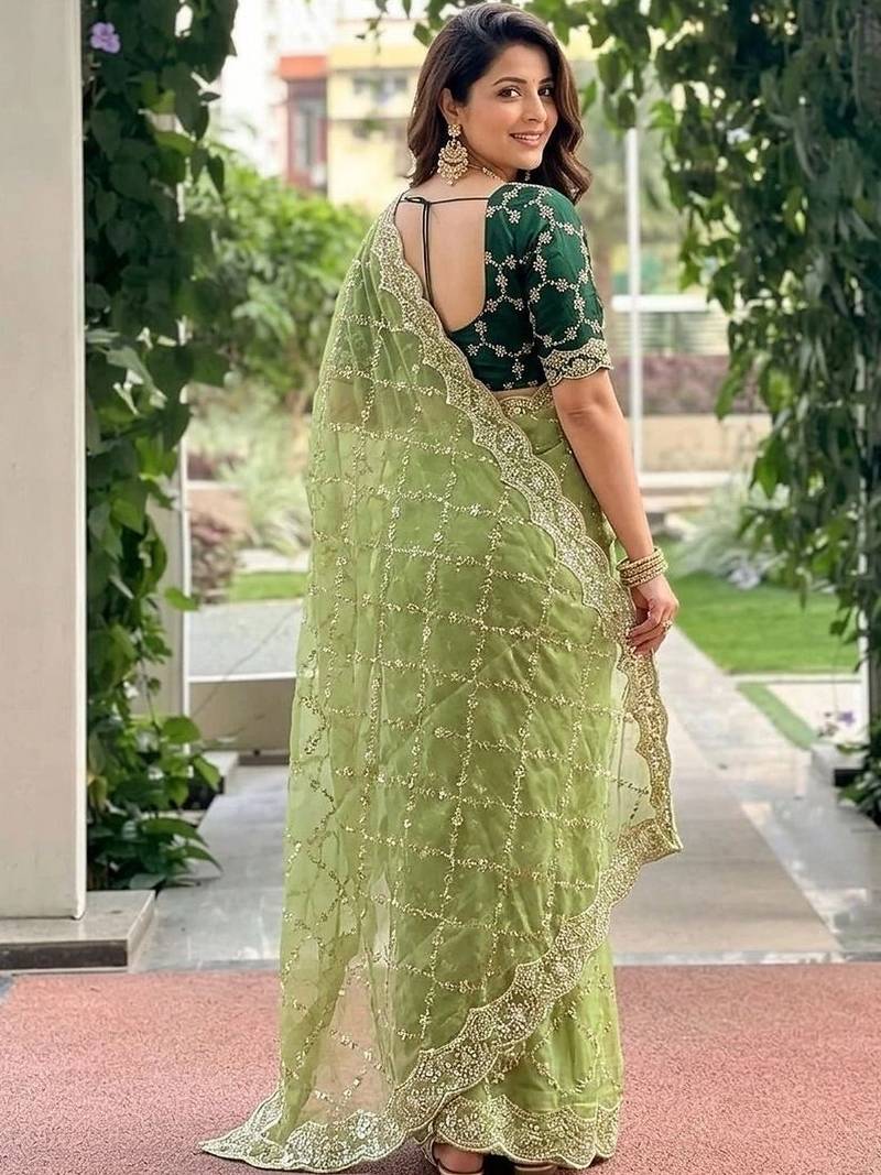 green embellished embroidered pure georgette heavy work saree