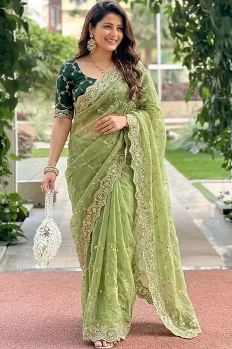 green embellished embroidered pure georgette heavy work saree