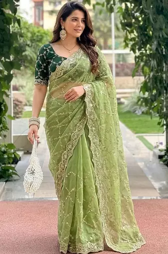green embellished embroidered pure georgette heavy work saree