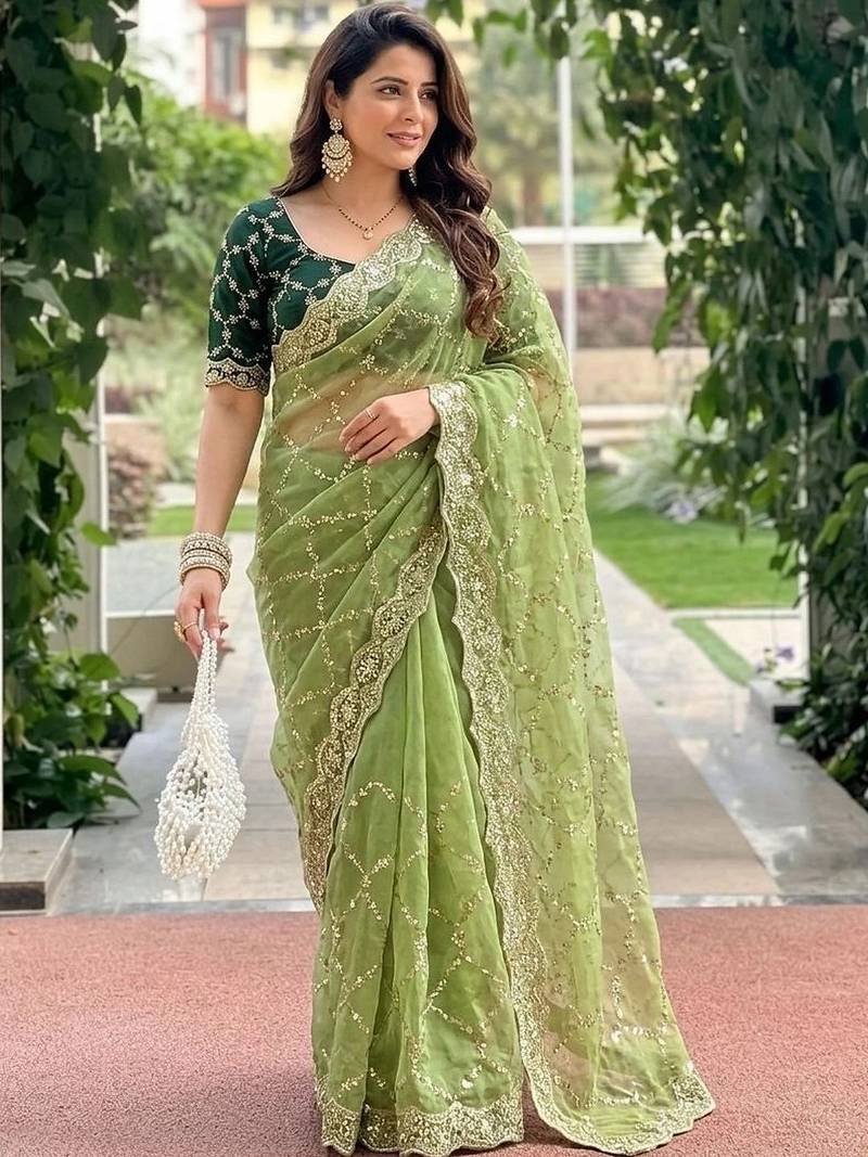 green embellished embroidered pure georgette heavy work saree