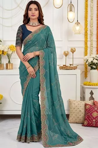 teal floral embroidered poly georgette heavy work saree