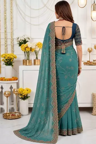 teal floral embroidered poly georgette heavy work saree