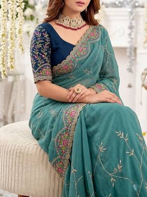 teal floral embroidered poly georgette heavy work saree 3