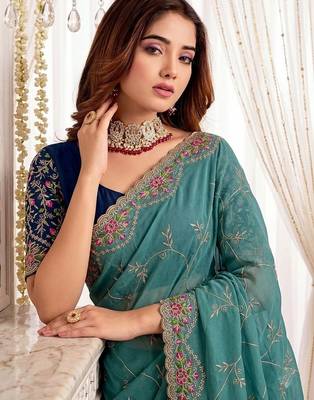 teal floral embroidered poly georgette heavy work saree 5