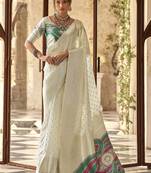 off_white woven design zari banarasi saree