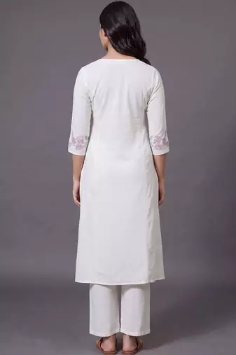 women floral embroidered regular thread work kurta with trousers
