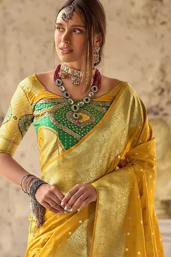 yellow woven design ethnic motifs zari banarasi saree