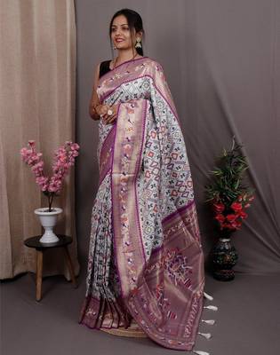 white blue & gold-toned ethnic motif woven design zari patola saree 1