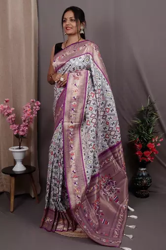 white blue & gold-toned ethnic motif woven design zari patola saree