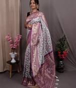 white blue & gold-toned ethnic motif woven design zari patola saree