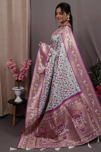 white blue & gold-toned ethnic motif woven design zari patola saree