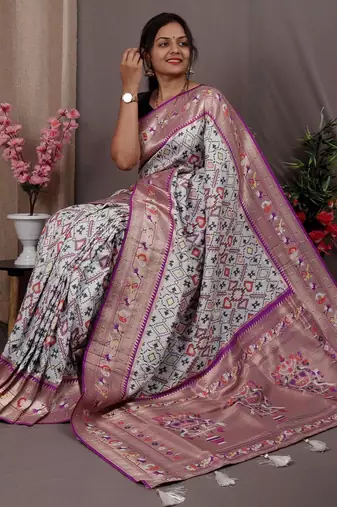 white blue & gold-toned ethnic motif woven design zari patola saree