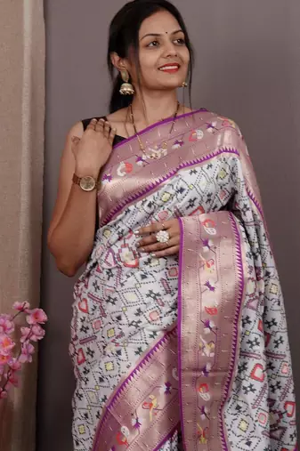 white blue & gold-toned ethnic motif woven design zari patola saree