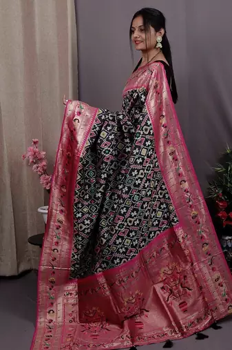black black & pink ethnic motifs woven design zari patola saree