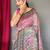 pink ethnic motif printed saree