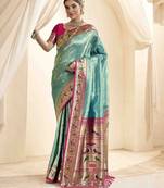 turquoise ethnic motifs woven design zari paithani saree