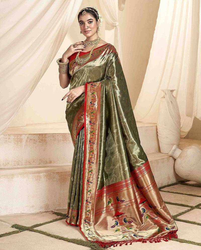 green woven design zari paithani saree