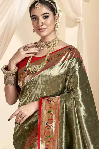 green woven design zari paithani saree
