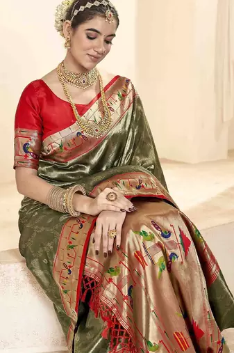 green woven design zari paithani saree