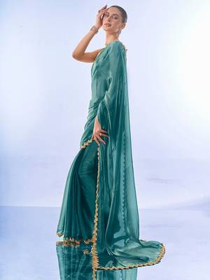 teal sequinned organza saree with blouse piece 2