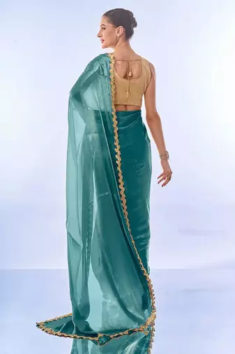 teal sequinned organza saree with blouse piece