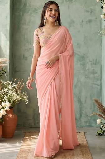 peach sequinned poly georgette saree