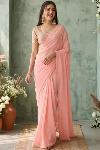 peach sequinned poly georgette saree