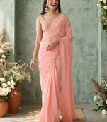 peach sequinned poly georgette saree