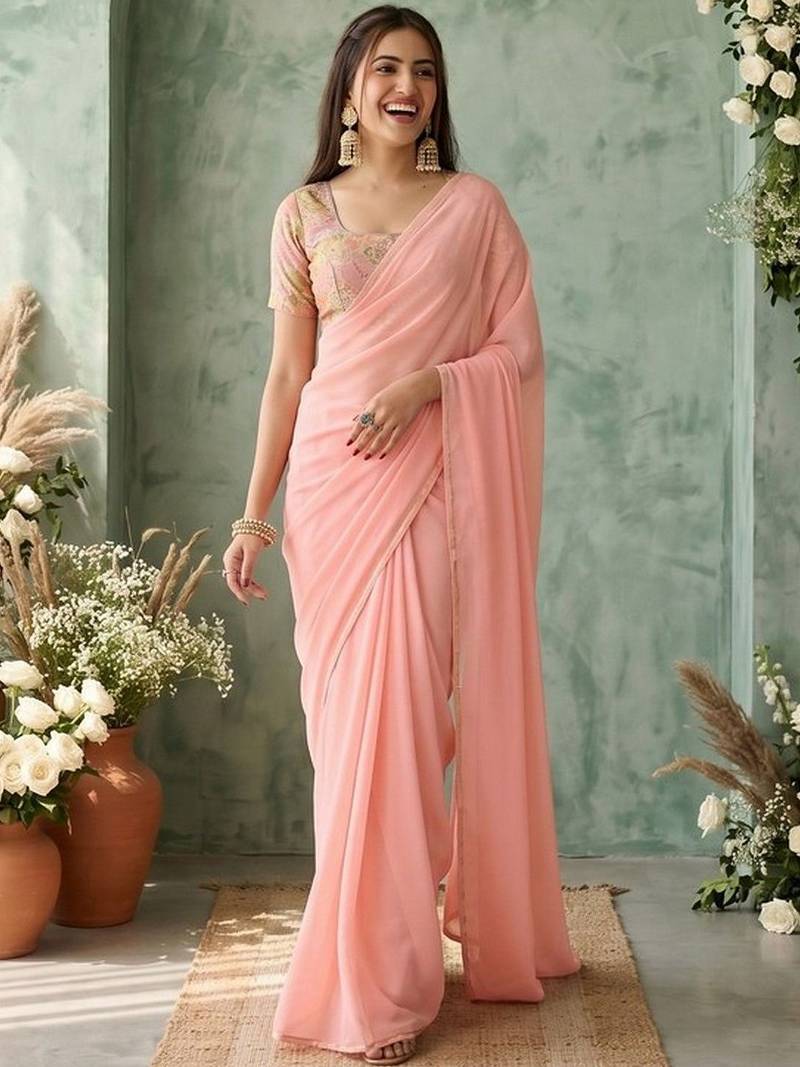 peach sequinned poly georgette saree