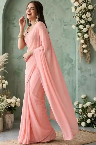 peach sequinned poly georgette saree