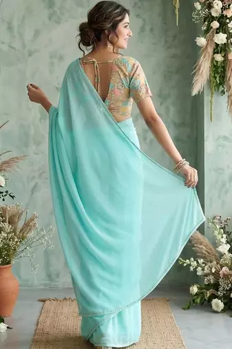 turquoise embroidered poly georgette saree