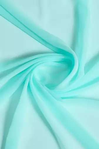 turquoise embroidered poly georgette saree