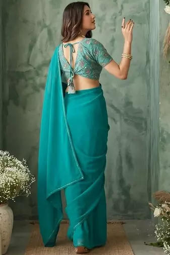 teal embellished sequinned poly georgette saree