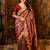 Maroon ethnic motifs woven design zari banarasi saree