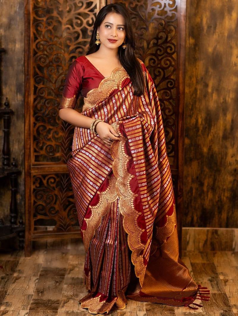 Maroon ethnic motifs woven design zari banarasi saree