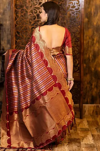 Maroon ethnic motifs woven design zari banarasi saree