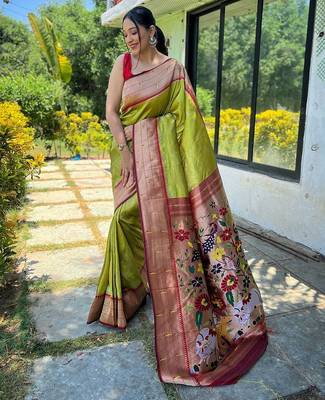 Green woven design zari silk blend paithani saree 1